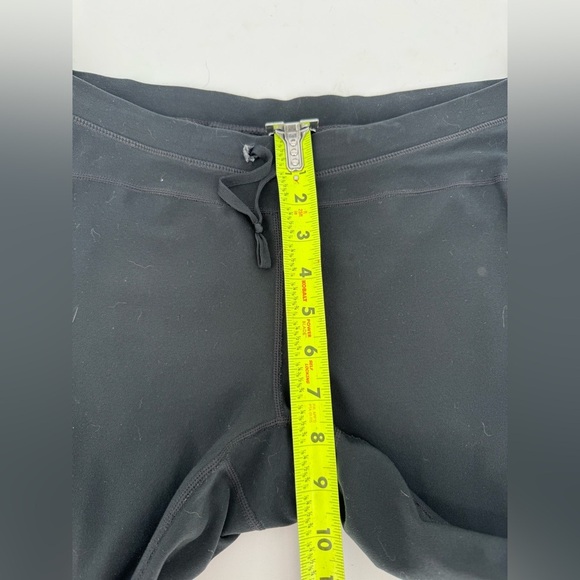 Nike Women's Dri-FIT Unlimited Zippered Cuff Versatile Pants - Picture 11 of 16